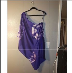 A Symetrical off shoulder blouse.